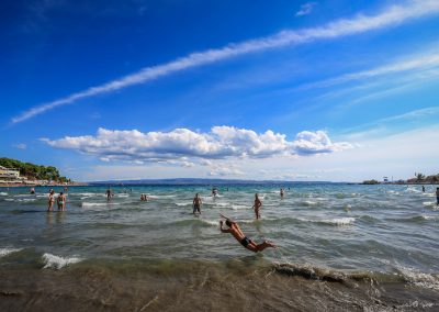 Traditional game 'picigin' in shallow waters on Bačvice beach