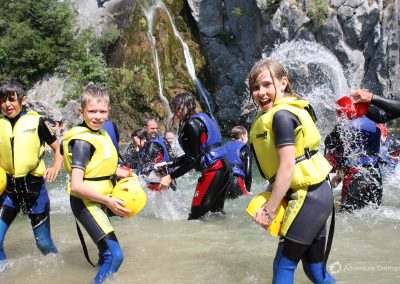 End of the canyoning tour in a lake below Small Gubavica waterfall, Cetina river gorge