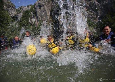 Water splashing in a lake at the end of canyoning tour; Split adventure excursion