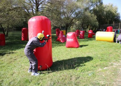 Inflattable terrain on a meadow by the river; Paintball with Split Adventure